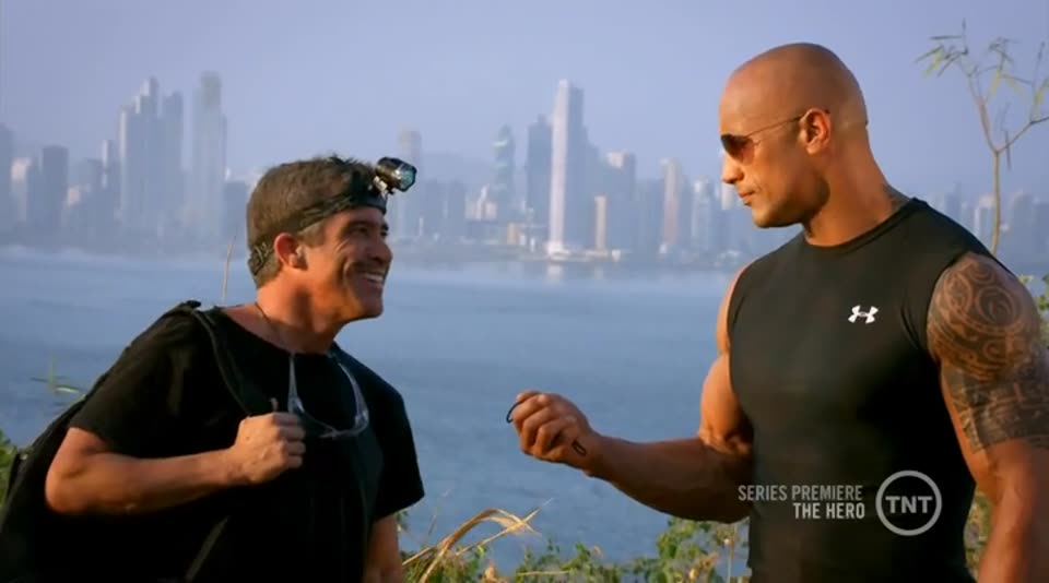 Dwayne Johnson on a rooftop in The Hero